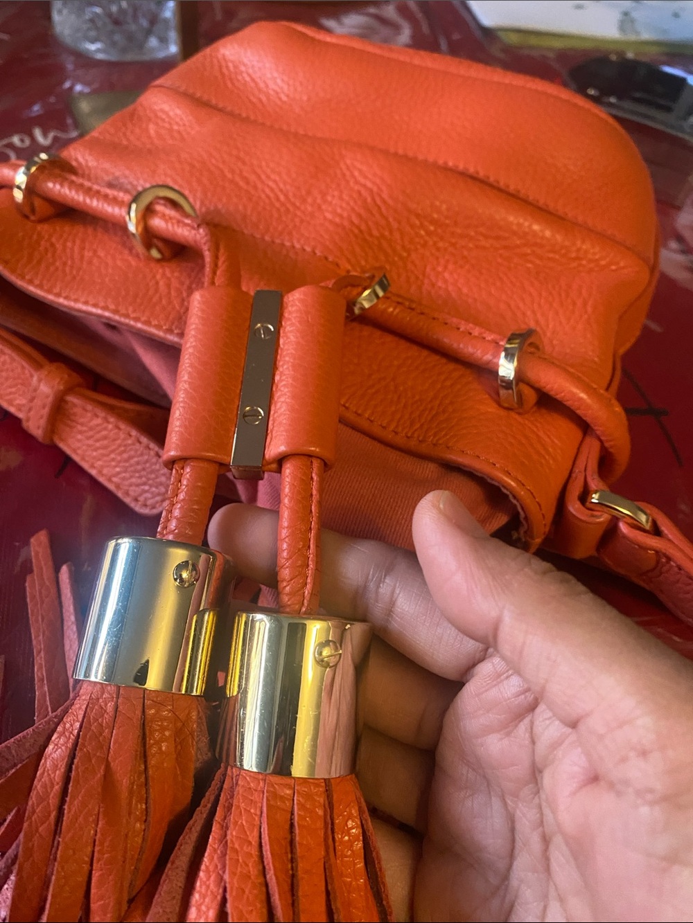 See By Chloé Orange Pebbled Leather Mini Bucket Bag with Tassels - Picture 14 of 15